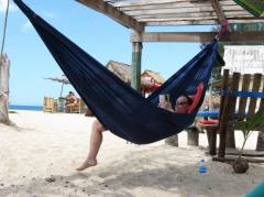 And Manu relaxing on the beach in a hammock